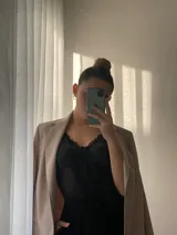 Body negro de tul con detalles de encaje, aro en el busto y breteles regulables.