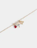 Collar corto con cadena dorada y dijes esmaltados: gato de la suerte japonés, cereza y corazón rojo.