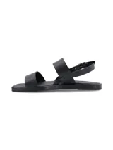 Sandalias plateadas de cuero con doble tira, pulsera de ajuste con hebilla metálica y suela plana.