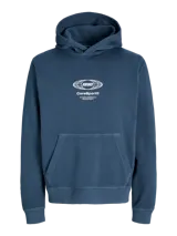 Buzo con capucha y manga larga, color azul oscuro (titan), con bolsillo canguro frontal y puños y ruedo acanalados. Presenta un estampado circular blanco en el pecho con el texto "1990", "CoreSport®", "ATHLETIC ESSENTIALS" y "CREATIVE DEPT.".