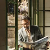 Lentes de sol Izipizi Sun #D, color marrón con marco redondo y patillas rectas.