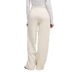 Pantalón de jogging color crema, de corte ancho y cintura alta con cordón ajustable.