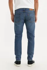 Jean de corte skinny color azul, tiro alto, confeccionado en tejido stretch.