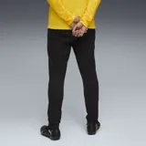 Pantalón deportivo negro con logo del Club Atlético Peñarol bordado en amarillo.