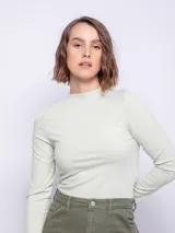 Polera de manga larga con escote redondo, de corte ajustado y tejido de canalé.
