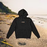 Buzo hoodie negro de corte oversize con capucha y cordón ajustable. Estampado en la espalda con diseño de dos palmeras y el sol dentro de un arco.