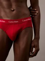 Pack de 3 slips Calvin Klein en colores rojo, azul y gris.
