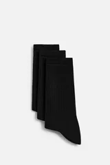 Pack de tres pares de calcetines negros de punto elástico con terminación acanalada.