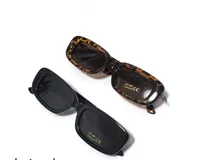 Lentes de sol rectangulares con montura gruesa de acetato, disponibles en color negro y carey.