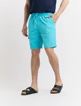 Short de baño color verde agua.