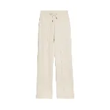 Pantalón de jogging color crema, de corte ancho y cintura alta con cordón ajustable.