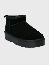 Botas cortas negras de cuero con plataforma de goma.