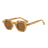 Lentes de sol unisex con marco octogonal transparente y lentes verdes. Fabricados con plástico reciclado.