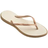 Ojotas Havaianas modelo Slim Point, color marrón terracota con tiras finas en tono metálico gris/plateado.