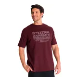 Remera color borgoña con estampa frontal gris de una máquina y texto "A Tractor Company Peoria USA".