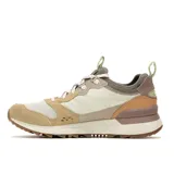 Sneaker de mujer con diseño en tonos beige y marrón, con detalles de gamuza y suela robusta.