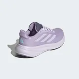 Championes de running Adidas Response Super color lila con detalles en blanco y gris.