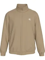 Campera color beige con cierre frontal y cuello alto. Logo de la marca en el pecho.