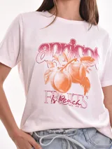Remera blanca de algodón con estampado de limones y texto en azul.