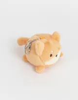 Llavero de peluche con forma de perro Shiba Inu color naranja con detalles en blanco y negro.