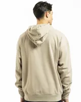 Buzo canguro verde con capucha y bolsillo frontal, de corte oversized.