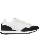 Zapatillas de running Tommy Jeans, blancas con detalles en negro.