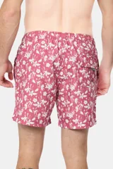 Short de baño celeste con estampado de flores blancas, cintura elástica con cordón ajustable, bolsillos laterales y suspensor de malla fina.