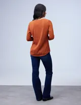 Blusa texturada de escote en V con cierre metálico, ajustada al cuerpo y de manga tres cuartos, de la marca Robert Louis.
