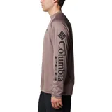 Remera de manga larga color marrón claro, ideal para pesca, confeccionada en tejido de secado rápido que absorbe la humedad y ofrece protección solar UPF 50.