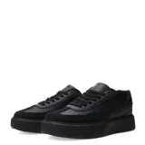 Zapatillas deportivas color beige con plataforma marrón y detalles en negro.