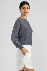 Sweater tejido en jersey con lurex, escote bote y detalle de tigre insignia de Polonio en la espalda.