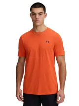 Remera deportiva Under Armour Vanish Elite para hombre, color naranja con logo azul en el pecho. Confeccionada en tejido transpirable y sin costuras para evitar rozaduras.