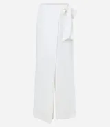 Pantalón pantalona negro de crepé con superposición y lazo lateral.