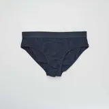 Pack de tres slips lisos de algodón color azul marino con cintura elástica.