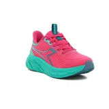 Championes deportivos Diadora modelo Proton para mujer, en colores rosa vibrante y turquesa. Presentan una capellada de malla transpirable con líneas de diseño en turquesa y la marca Diadora visible en la lengüeta. La suela es gruesa y texturizada en color turquesa, con puntera en gris oscuro.