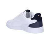 Championes Puma Shuffle de hombre, color blanco con detalles en azul marino y dorado.