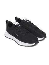 Championes Under Armour Street Mirage color negro con detalles en blanco, capellada de malla transpirable y suela de goma de alta tracción.