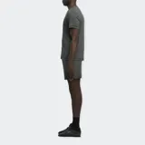 Short deportivo de punto color gris con cintura elástica y logo Reebok Vector en el muslo.