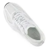 Championes New Balance modelo U530, color blanco con detalles en gris y negro, confeccionados en malla y material sintético, con logo "N" característico en los laterales y entresuela ENCAP.