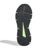 Championes Adidas color verde flúor con detalles en negro y suela blanca.