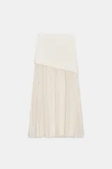 Falda midi color crema con cintura elástica y tejido plisado.