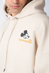 Buzo canguro negro de algodón friza, corte oversize y estampa de Mickey Mouse con detalles en verde.