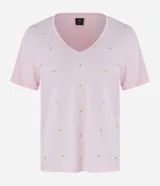Blusa roja de viscosa con escote en V y corazones metalizados aplicados.