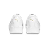Championes Puma Carina Street de mujer, color blanco con detalles en celeste y rosa.