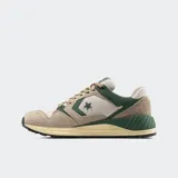 Championes Converse Wave Trainer Peak Style color beige y verde, con capellada de malla y gamuza, amortiguación de espuma CX y mediasuela viscoelástica.