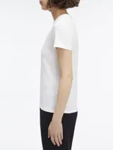 Remera blanca de algodón con corte slim y logo 'ck' bordado en el pecho.