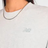 Remera corta de algodón color gris con logo de New Balance estampado en el pecho.