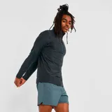 Abrigo deportivo negro con cierre 1/4 en el cuello y tejido space dye.