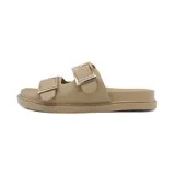 Sandalias bajas color beige con dos tiras anchas y hebillas doradas ajustables.
