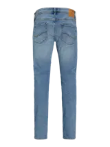 Jean de cinco bolsillos de calce slim fit con tiro bajo, rodilla ajustada y abertura de pierna ceñida. Tejido de sarga super stretch azul denim.